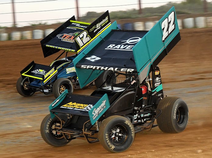 Brandon Spithaler (22) races past Darin Gallagher on Sunday evening at Tri-City Raceway Park. (Hein Brothers Photo)