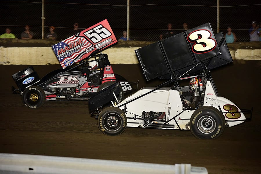 Hunter Schuerenberg (55) races alongside Austin O'Dell during Friday's Morrow Brothers Ford MOWA Sprint Car Series event at Jacksonville Speedway. (Mark Funderburk Photo)