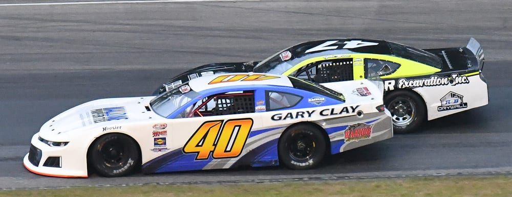 Nick Sweet (40) battles alongside Gabe Brown during Sunday's PASS Super Late Model event at White Mountain Motorsports Park. (Norm Marx Photo)