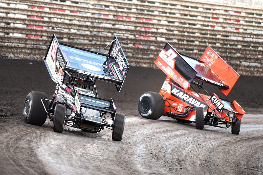 McKenna Haase (55) races ahead of Kasey Kahne Saturday at Knoxville Raceway. (Paul Arch Photo)
