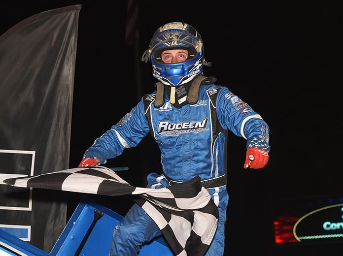 Cory Eliason celebrates his $20,000 victory Sunday at Huset's Speedway. (Paul Arch Photo)