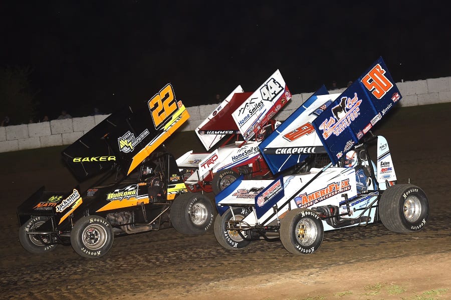 Jesse Baker (22) races ahead of Zach Chappell and Jesse Love (44) during Wednesday's ASCS Sprint Week round at Caney Valley Speedway. (Paul Arch photo)