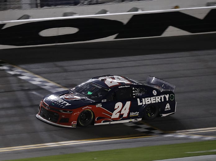 William Byron crosses the finish line to win his first NASCAR Cup Series race Saturday at Daytona Int'l Speedway. (HHP/Harold Hinson Photo)