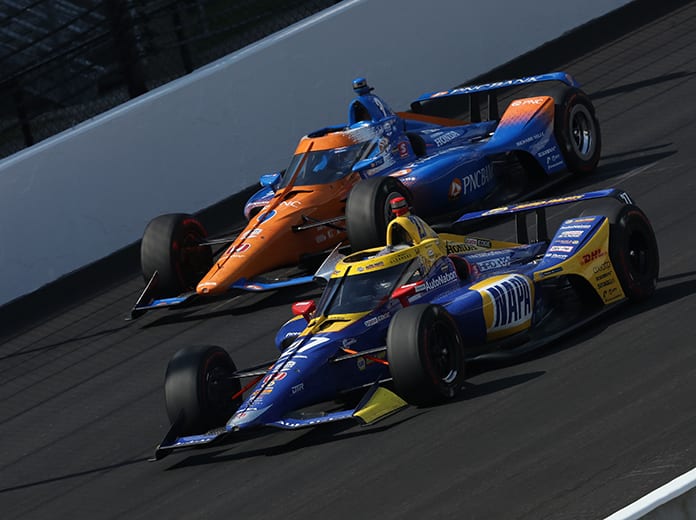 Alexander Rossi (27) battles Scott Dixon for the race lead Sunday at Indianapolis Motor Speedway. (IndyCar Photo)