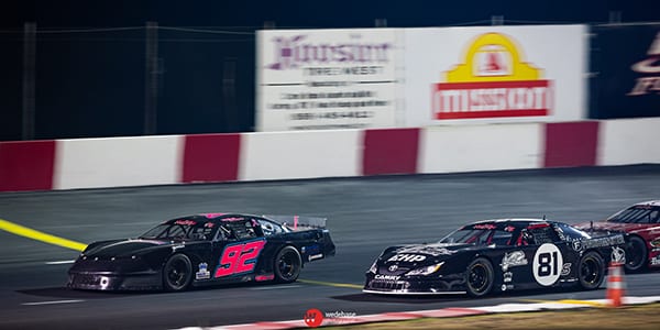 Dylan Zampa (92) holds off Buddy Shepherd in Nut Up Pro Late Model action Saturday at Madera Speedway. (Jason Wedehase Photo)