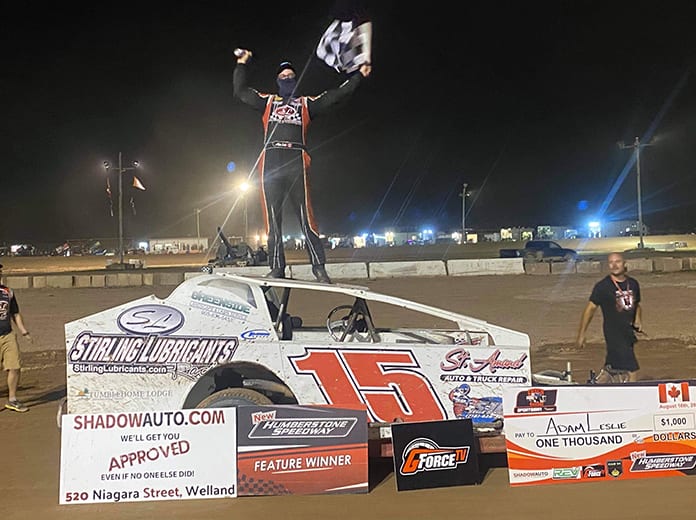 Aadm Leslie celebrates a victory in the Cosco Haulage DIRTcar Sportsman class Sunday at Humberstone Speedway. (Steve Ruddy Photo)