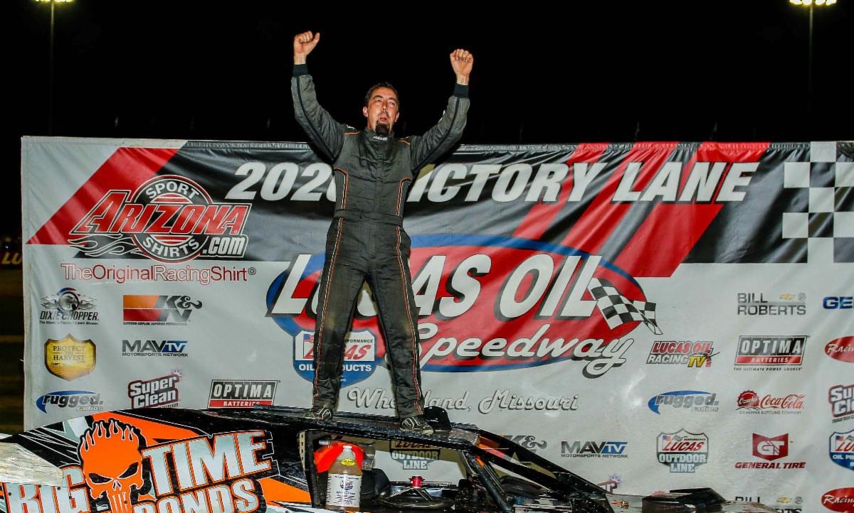 Darron Fuqua celebrates his Pitts Homes USRA Modified feature win Saturday night at Lucas Oil Speedway. (GS Stanek Racing Photography)