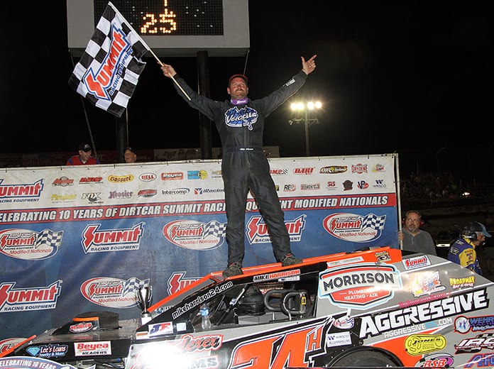 Mike Harrison celebrates his victory in Thursday's DIRTcar Summit Modified Nationals event at Macon Speedway. (Jim Denhamer Photo)