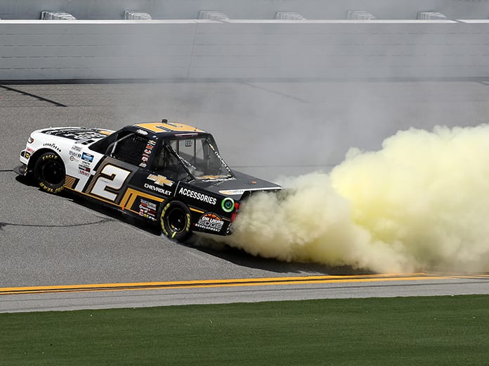 Sheldon Creed celebrates with a burnout after winning Sunday's NASCAR Gander RV & Outdoors Truck Series race on the Daytona Int'l Speedway Road Course. (Chris Graythen/Getty Images Photo)