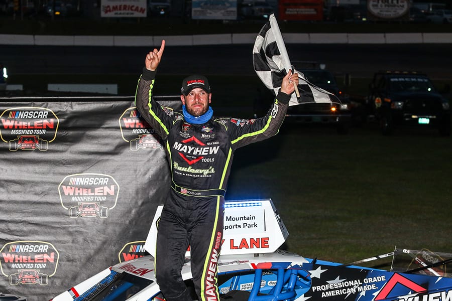 Doug Coby emerges from his car after winning Saturday's NASCAR Whelen Modified Tour event at White Mountain Motorsports Park. (Dick Ayers Photo)
