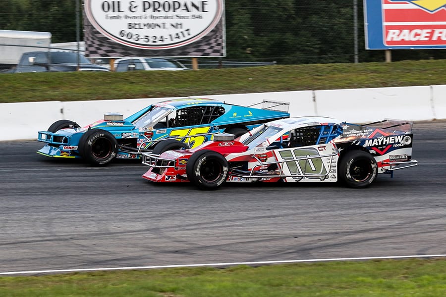 Doug Coby (10) races to the inside of Chris Pasteryak during Saturday's NASCAR Whelen Modified Tour event at White Mountain Motorsports Park. (Dick Ayers Photo)