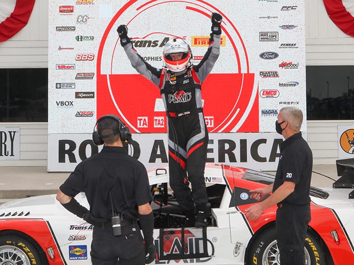 Chris Dyson celebrates after winning Saturday's Trans-Am Series event at Road America.