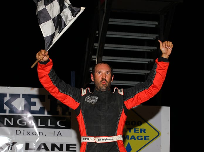Bill Leighton celebrates his victory Saturday night at Davenport Speedway. (Mike Ruefer Photo)