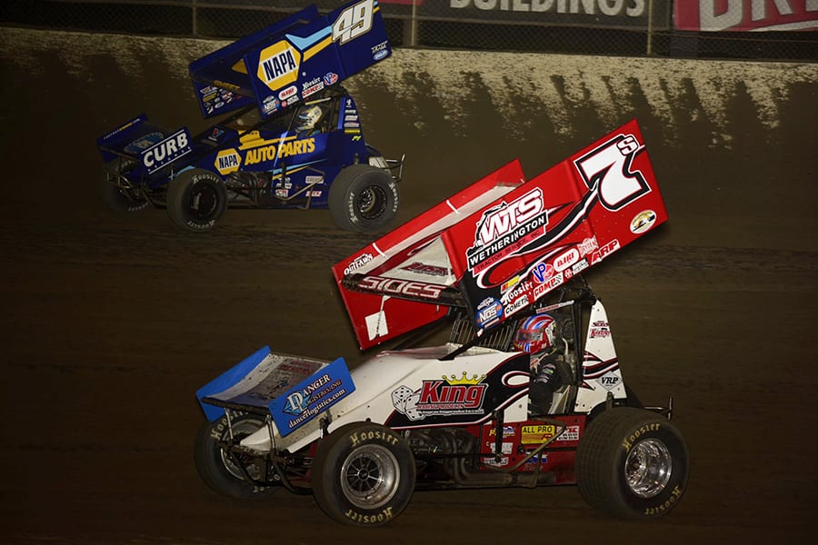 Jason Sides (7s) races under Brad Sweet during Friday's World of Outlaws NOS Energy Drink Sprint Car Series feature at Federated Auto Parts Raceway at I-55. (Mark Funderburk Photo)