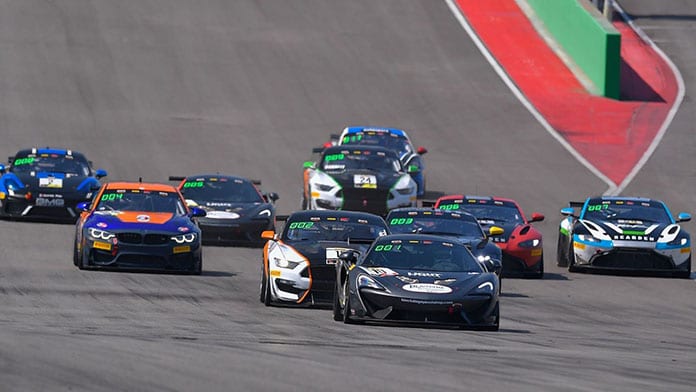 The Pirelli GT4 America Sprint field storms down the front straight Friday at Circuit of the Americas.