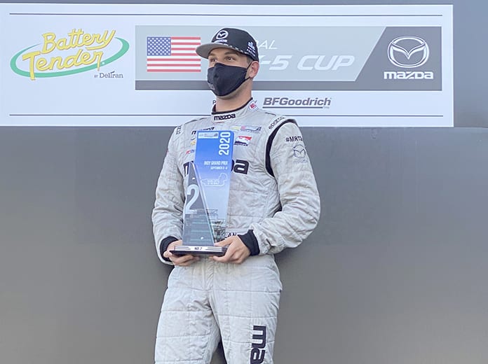Selin Rollan won Friday morning's Battery Tender Global Mazda MX-5 Cup at Indianapolis Motor Speedway.