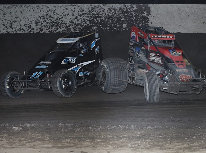 Korey Ruble (17) makes contact with Kyle Cummins as they race for the lead during the Haubstadt Hustler Saturday at Tri-State Speedway. (Neil Cavanah Photo)