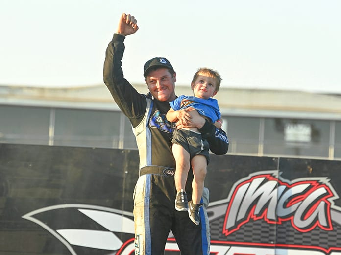 Ricky Thornton Jr. celebrates with his son in victory lane after winning the modified finale during the IMCA Speedway Motors Super Nationals. (Tom Macht Photo)