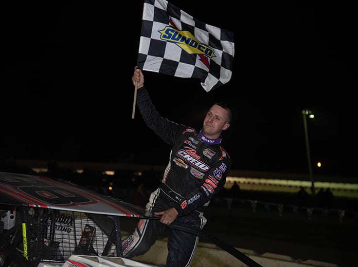 Mat Williamson celebrates a $10,000 victory Saturday at Devil's Bowl Speedway. (Dylan Friebel Photo)