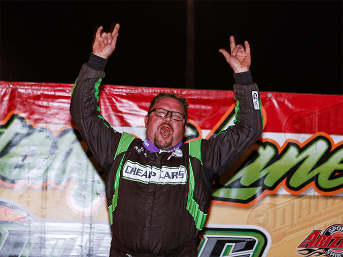 Jason Feger celebrates Friday night in victory lane at Farmer City Raceway. (Tyler Carr Photo)