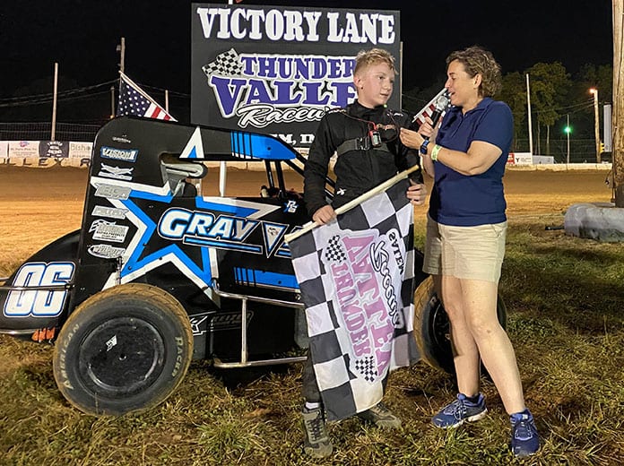 Rylan Gray is interviewed in victory lane after winning Friday's All Star Circuit of Champions TQ Midget feature at Thunder Valley Raceway. (Lenny Batycki/PRN's At the Track Photo)