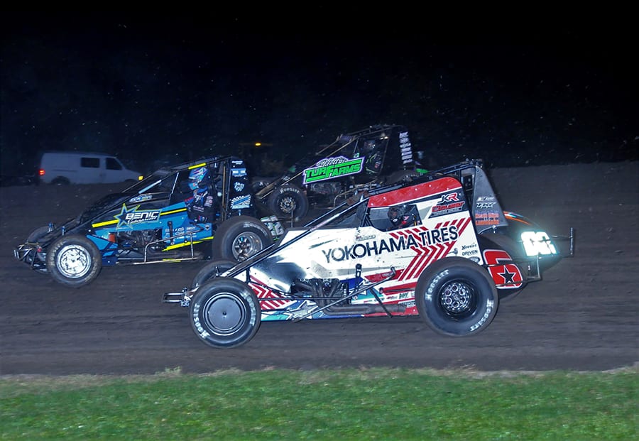 Mario Clouser (6), Brandon Long (02), Chase Johnson (22) and Slater Helt battle four-wide during Friday's USAC AMSOIL National Sprint Car Series feature at Gas City I-69 Speedway. (Randy Crist Photo)