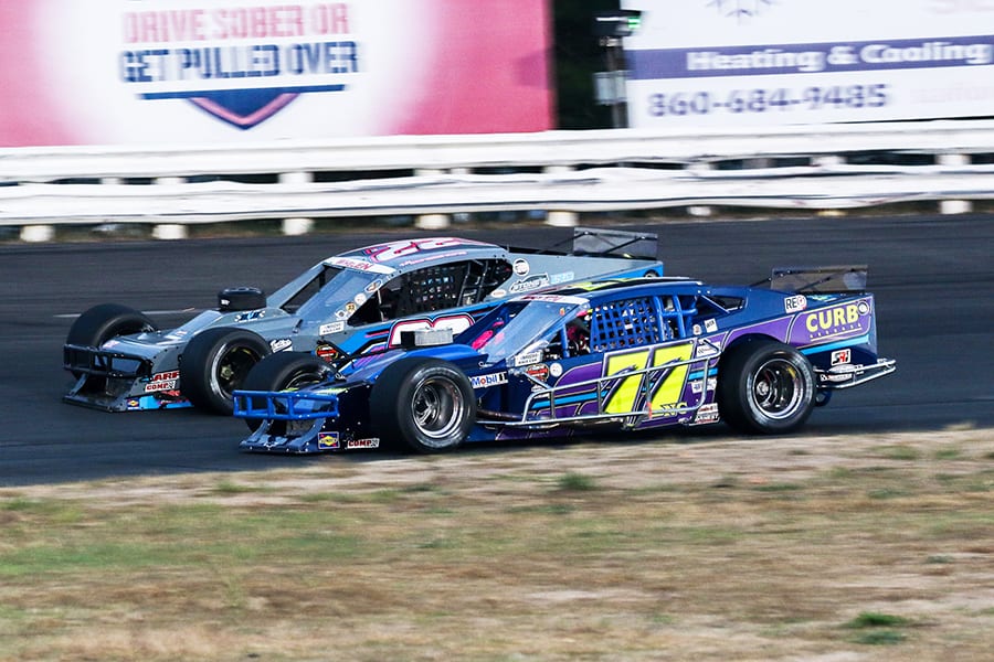 Max McLaughlin (77) battles Kyle Bonsignore during Saturday's NASCAR Whelen Modified Tour event at Stafford Motor Speedway. (Dick Ayers Photo)