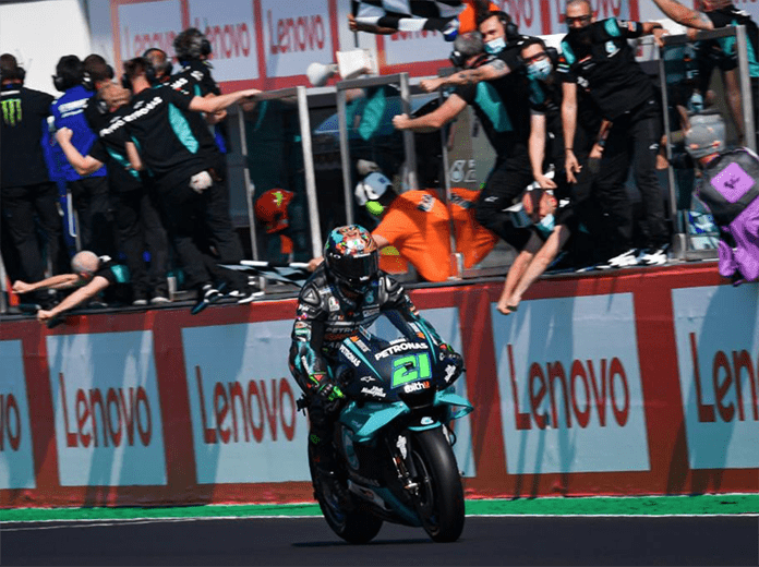 Franco Morbidelli crosses the finish line to earn his first MotoGP victory on Sunday. (MotoGP Photo)