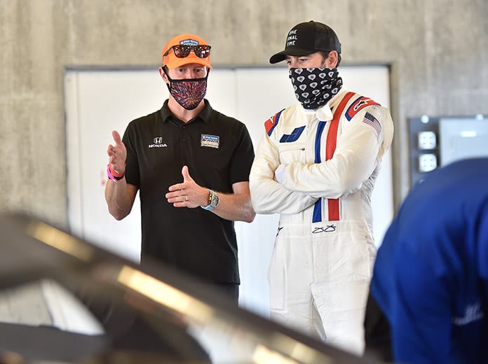 Jimmie Johnson (right) and Scott Dixon (left) during Johnson's recent NTT IndyCar Series test at Indianapolis Motor Speedway. (IndyCar Photo)