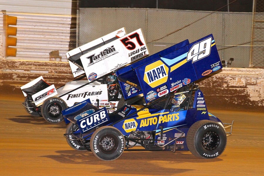 Kyle Larson (57) battles past Brad Sweet during Saturday's World of Outlaws Nittany Showdown finale at Port Royal Speedway. (Dan Demarco photo)