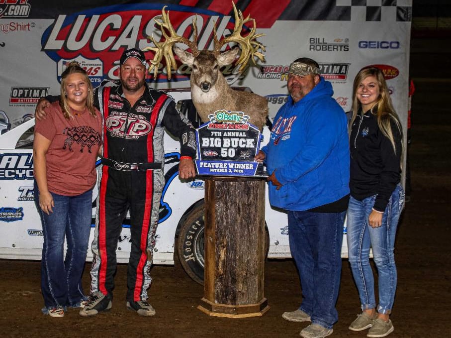 Peyton Taylor in victory lane after winning the Big Buck 50 at Lucas Oil Speedway. (GS Stanek photo)