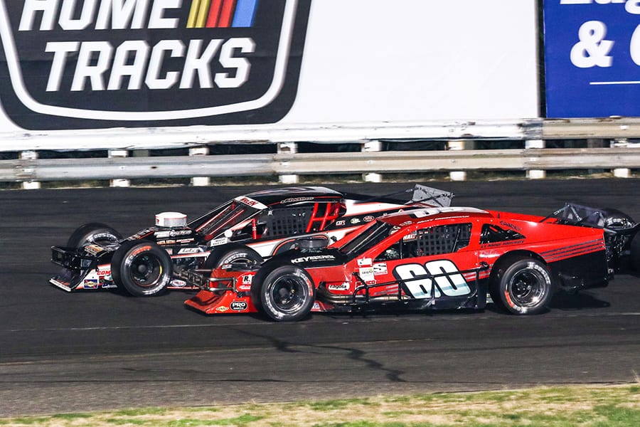 Matt Hirschman (60) battles Chase Dowling during Saturday's Tri Track Open Modified Series race at Stafford Motor Speedway. (Dick Ayers Photo)