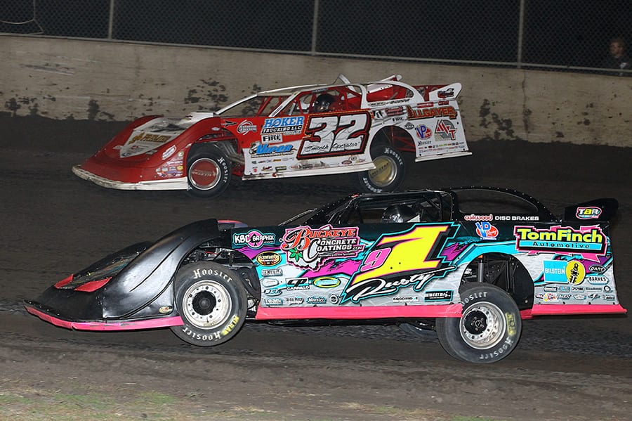 Rusty Schlenk (1) battles Bobby Pierce during Friday's Lucas Oil MLRA event at Tri-City Speedway. (Mike Ruefer Photo)