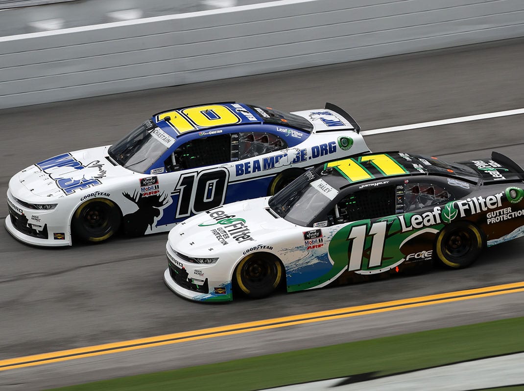 DAYTONA BEACH, FLORIDA - AUGUST 15: Justin Haley, driver of the #11 LeafFilter Gutter Protection Chevrolet, races Ross Chastain, driver of the #10 Moose Fraternity Chevrolet, during the NASCAR Xfinity Series UNOH 188 at Daytona International Speedway on August 15, 2020 in Daytona Beach, Florida. (Photo by Chris Graythen/Getty Images)