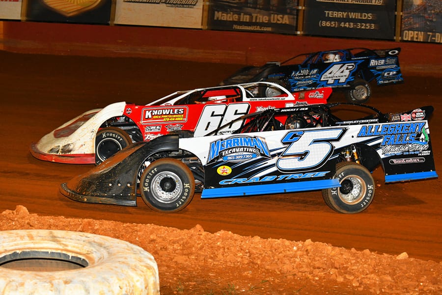 David Crabtree (C5), Jake Knowles (66) and Dalton Cook (44) race three-wide during Friday's Southern All Star Series event at Smoky Mountain Speedway. (Michael Moats Photo)