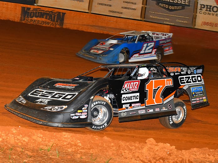 Dale McDowell (17m) battles Ashton Winger Friday night at Smoky Mountain Speedway. (Michael Moats Photo)