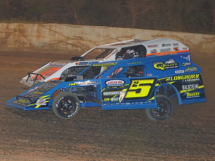 Tyler Nicely (5) battles Justin Allgaier Friday at 411 Motor Speedway. (Chad Wells Photo)