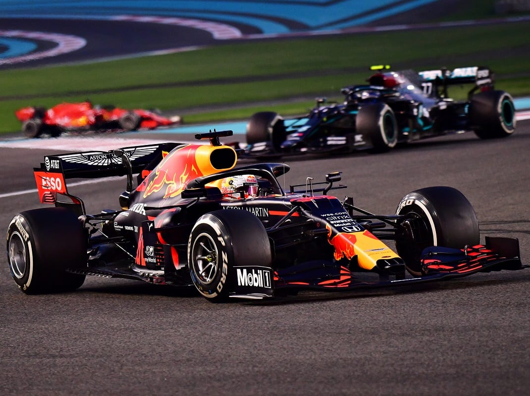 Max Verstappen (33) leads Valtteri Bottas during Sunday's Abu Dhabi Grand Prix. (Giuseppe Cacace/Getty Images for Red Bull photo)