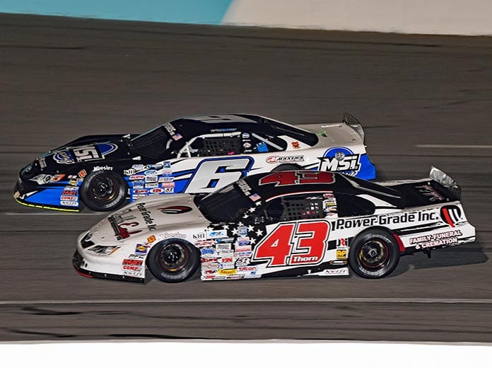 Derek Thorn (43) battles Tyler Fabozzi for the race lead during Saturday's SPEARS Southwest Tour Series feature at Kern County Raceway Park. (Steve Himelstein Photo)