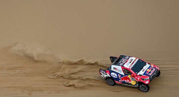 Nasser Al-Attiyah and Matthieu Baumel in the Toyota Hilux of Toyota Gazoo Racing during the 11th stage of the Dakar Rally. (Red Bull Content Pool photo)