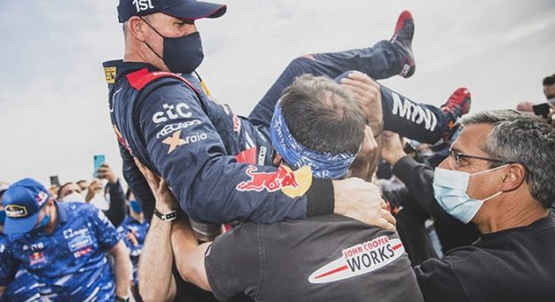 Stephane Peterhansel celebrates after winning his 14th Dakar Rally on Friday. (Red Bull Photo)