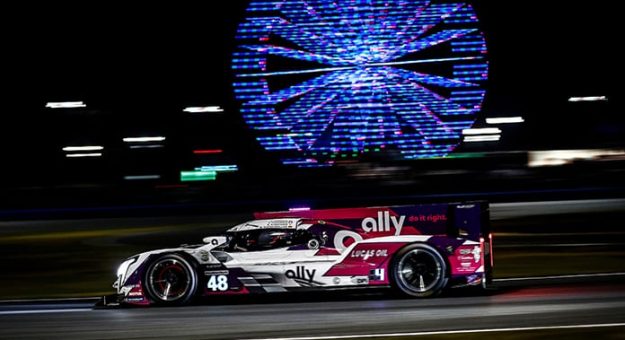 The No. 48 Action Express Racing Cadillac DPi shared by Jimmie Johnson, Kamui Kobayashi, Simon Pagenaud and Mike Rockenfeller was at the front of the field after eight hours in the Rolex 24. (IMSA Photo)