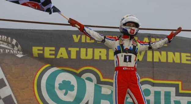Buddy Kofoid celebrates his victory Saturday at Bubba Raceway Park. (Rich Forman Photo)