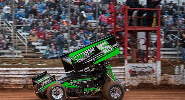 Tim Wagaman crosses the finish line to win the Ice Breaker Saturday at Lincoln Speedway. (Shawn Cooper Photo)