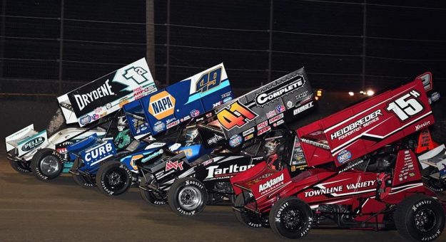 The field for Friday's World of Outlaws NOS Energy Drink Sprint Car Series race prepares to go racing at Volusia Speedway Park. (Frank Smith Photo)