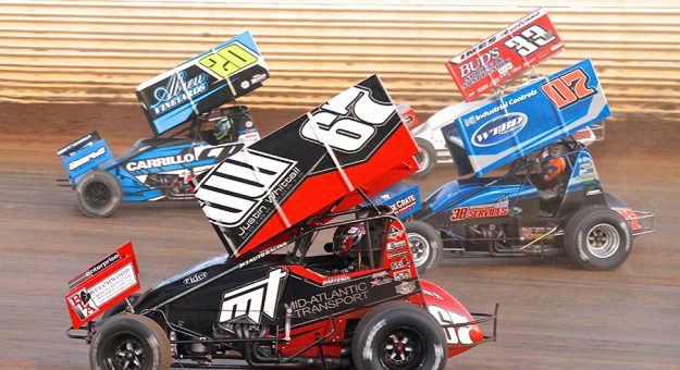 Justin Whittal (67), Ryan Taylor (20), Lucas Wolfe (07) and Gerald McIntyre battle for position Saturday at Port Royal Speedway. (Dan Demarco Photo)