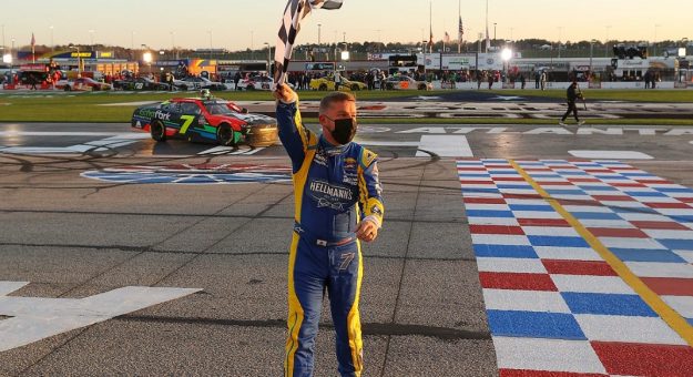 HAMPTON, GEORGIA - MARCH 20: Justin Allgaier, driver of the #7 Axalta/EchoPark Automotive Chevrolet, celebrates with the checkered flag after winning the NASCAR Xfinity Series EchoPark 250 at Atlanta Motor Speedway on March 20, 2021 in Hampton, Georgia. (Photo by Kevin C. Cox/Getty Images) | Getty Images