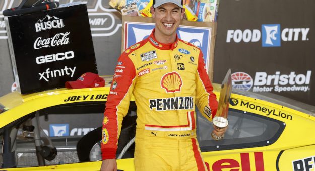 BRISTOL, TENNESSEE - MARCH 29: Joey Logano, driver of the #22 Shell Pennzoil Ford, celebrates in victory lane after winning the NASCAR Cup Series Food City Dirt Race at Bristol Motor Speedway on March 29, 2021 in Bristol, Tennessee. (Photo by Chris Graythen/Getty Images) | Getty Images