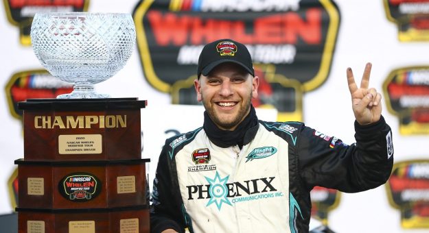 Justin Bonsignore, driver of the #51 Phoenix Communications Inc. Chevrolet, celebrate sin victory lane after winning the Championship after the Sunoco World Series 150 for the NASCAR Whelen Modified Tour at Thompson Speedway Motorsports Park in Thompson, Connecticut on October 11, 2020. (Adam Glanzman/NASCAR)