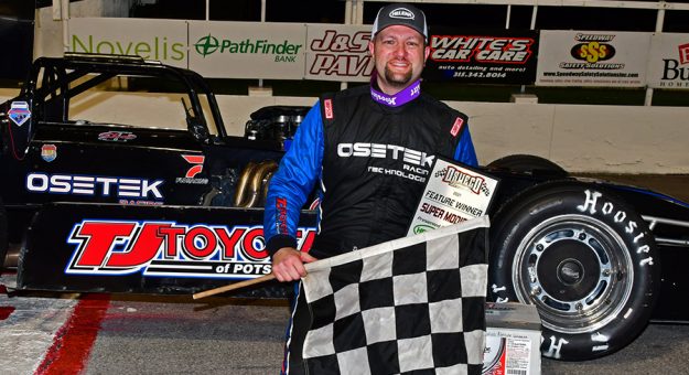 Dave Shullick Jr. in victory lane Saturday at Oswego Speedway. (Rick Nelson Photo)